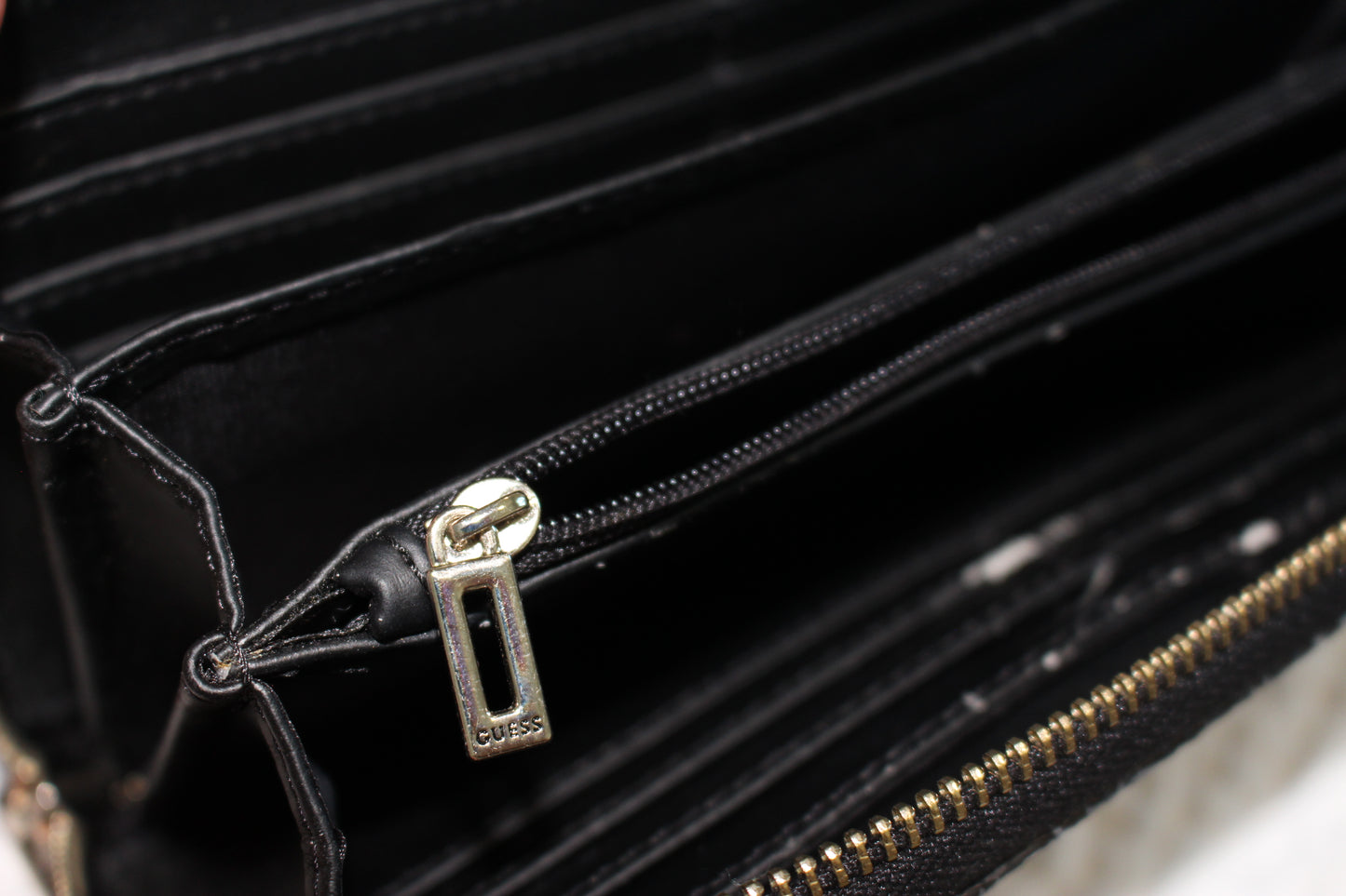 GUESS Black Wallet with Gold Emblem